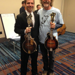 Scott Napier and Sam Bush pose holding each other's late '30s block style F5s