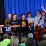 Chris Sexton brings his students on stage with Nothin' Fancy at the 2015 Nothin' Fancy Bluegrass Festival - photo © Bill Warren