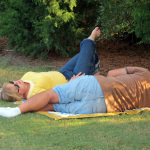 Afternoon nap at the Outer Banks Bluegrass Festival - photo by Woody Edwards