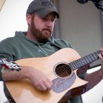 Thomas Trapp with Bluegrass Bullies at the 2012 Oklahoma International Bluegrass Festival - photo by Tom Dunning