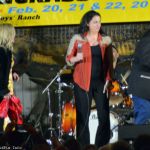 Lizzy Long tries to steal the spotlight from Rhonda Vincent with Gene Watson at Palatka Bluegrass Festival (February 2014) - photo © Bill Warren