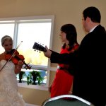 Rachel plays and sings with Darin & Brooke Aldridge at her wedding reception - photo by Ted Lehmann