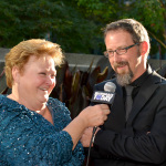 Buddy Melton with Katy Daley on the 2013 IBMA Red Carpet - photo by Milo Farineau
