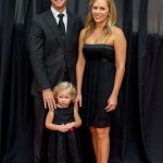 Alan Bartram and his wife Kristina with their daughter on the 2014 IBMA Red Carpet - photo by Todd Powers