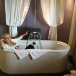 Rhonda Vincent posing in her lavish suite in Germany during their 2015 European Tour