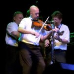 Johnny Warren on the fiddle with Earls of Leicester at RockyGrass 2013. Fine, old-time sound - photo by Shannon Turner
