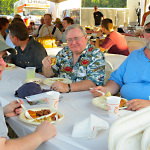 Eatin' in the BBQ tent at ROMP 2012 - photo by Woody Edwards