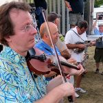 The Vince Gill Bluegrass Band warming up before their set at ROMP 2012 - photo by Terry Herd