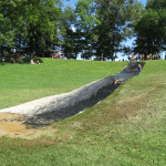 Giant water slide at ROMP 2013 - photo by Terry Herd