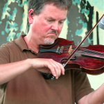 Mike Hartgrove with Lonesome River Band at ROMP 2012 - photo by Woody Edwards