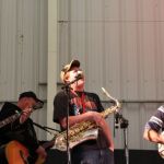 Rooster's grandson Layne on sax at Roosterfest - April 21, 2013 - photo by Tara Linhardt