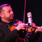 Jason Carter with Del McCoury Band at the 2015 Red, White & Bluegrass Festival - photo © Laura Tate Photography