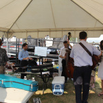 Darin & Brooke Aldridge warming up before their set at Red, White & Bluegrass 2012 - photo © Laura Tate Photography