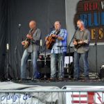 Dustin Benson sitting in with Lonesome River Band at Red, White & Bluegrass 2013 - photo by Bill Warren