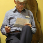 Tom Gray reviewing the set list before the Seldom Scene 40th Anniversary show - photo by Katy Daley