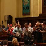 Members of Steep Canyon Rangers take part in the mega banjo jam at the dedication of the Earl Scruggs Center - photo by John Goad