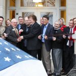 Ribbon cutting at the dedication of the Earl Scruggs Center - photo by John Goad