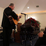 James Alan Shelton performs at George Shuffler's funeral (4/9/14) - photo by Becky Johnson