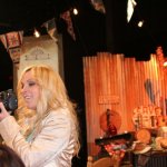 Rhonda Vincent snapping photos during the shoot for Simply Bluegrass - photo © 2013 by Phil Johnson