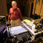 Dewey Peters mans the board at the Sizemore Benefit Show in Roanoke (2/19/12) - photo © Dean Hoffmeyer
