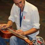 Chad Graves warming up before the Slidegras Extravaganza at World of Bluegrass 2012 - photo by David Morris