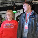 Lorraine Jordan and a rep from the Dolly Parton Foundation speak at the 2016 Christmas in the Smokies festival in Pigeon Forge, TN - photo © Bill Warren