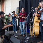 Soundmen like Jesse worked hard to get things right. Here he is sound checking Joe Walsh & Sweet Loam at the 2016 World of Bluegrass - photo by Tara Linhardt