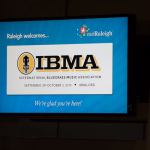 Welcome bluegrass sign at the Raleigh Airport - photo © Tara Linhardt