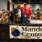 Dick Brown and Tony Williamson in the Mandolin Central booth in the exhibit hall at World of Bluegrass 2015 - photo © Tara Linhardt