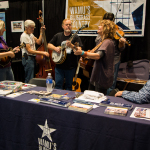 Valerie Smith's band showcasing in Exhibit Hall at WAMU booth at World of Bluegrass 2015 - photo © Tara Linhardt