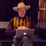 Joe Craven telling stories at the 2015 Wide Open Bluegrass Festival - photo by Tara Linhardt