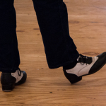 Rodney Sutton teaches clogging at the 2015 Wide Open Bluegrass Festival - photo by Tara Linhardt