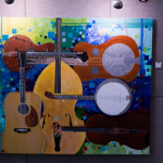 Bluegrass-based art for sale at the 2015 Wide Open Bluegrass Festival - photo by Tara Linhardt