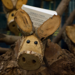 Funny wooden pigs for sale at the 2015 Wide Open Bluegrass Festival - photo by Tara Linhardt