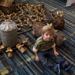 Funny wooden pigs for sale at the 2015 Wide Open Bluegrass Festival - photo by Tara Linhardt