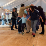 Square dance in the dance tent at the 2015 Wide Open Bluegrass Festival - photo by Tara Linhardt
