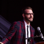 Daniel Mullins accepts his Best Liner Notes award at the 2016 Wold of Bluegrass - photo © Tara Linhardt