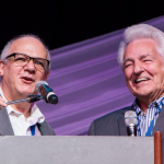 Jon Weisberger and Del McCoury presenting at the Special Awards at the 2016 Wold of Bluegrass - photo © Tara Linhardt