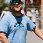 Anders Beck of Greensky Bluegrass biking at Telluride 2013 - photo © Jason Lombard