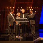 The many McCourys (Rob, Jean, Del, Ronnie) presenting at the 2015 IBMA Awards - photo © Todd Powers