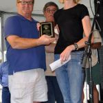 Sarah Jane Rayburn accepts the SEMBMA Hall of Honor induction for her uncle, Larry McDaniel, at The Auburn Hills Parade of Stars (9/10/16) - photo © Bill Warren