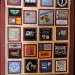 A quilt made from t-shirts was auctioned with proceeds going to MACC at the 2016 Fall SOIMF - photo © Bill Warren