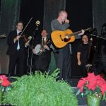 Junior Sisk surprises the Radio Ramblers by appearing on stage in a gorilla suit at the 2016 Fall SOIMF - photo © Bill Warren