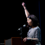 Laurie Okun, Sales Director of Raleigh Convention Center, discussed how excited and happy they were to host IBMA again - photo © Tara Linhardt