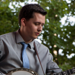 Seth Rhinehart with Mark Kuykendall, Bobby Hicks and Ashville Bluegrass at Wide Open Bluegrass 2016 - photo © Tara Linhardt