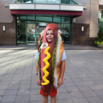 Kid in hotdog outfit at Wide Open Bluegrass 2016 - photo © Tara Linhardt