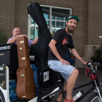 Answering the question, "Can you get a whole band in a rickshaw" at Wide Open Bluegrass 2016 - photo © Tara Linhardt