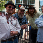 Songs from the Road Band hanging out before their show with luthier Jamie Griggs at Wide Open Bluegrass 2016 - photo © Tara Linhardt