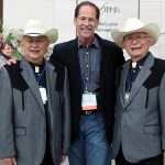 The Ozaki Brothers pose with Wayne Taylor at World of Bluegrass 2013 - photo by Tar Linhardt