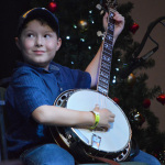 Chris Davis' son makes his stage debut with Marty Raybon at the 2015 Christmas in the Smokies Bluegrass Festival